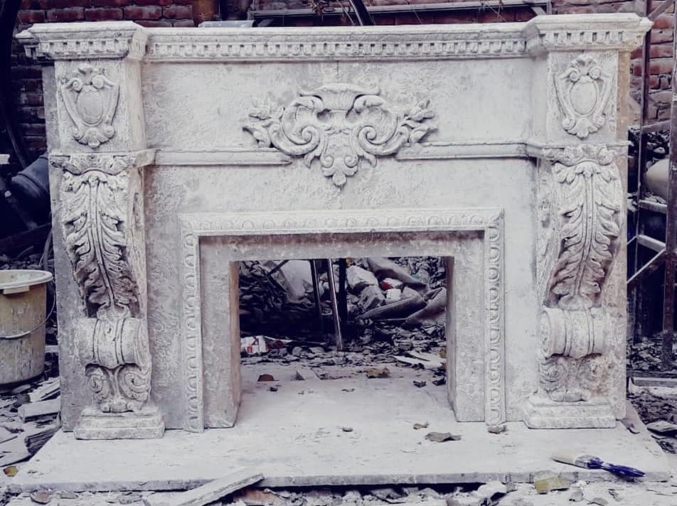 Carved fireplace surround